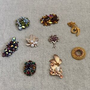 9pc Assorted Gold and Purple Brooch Set